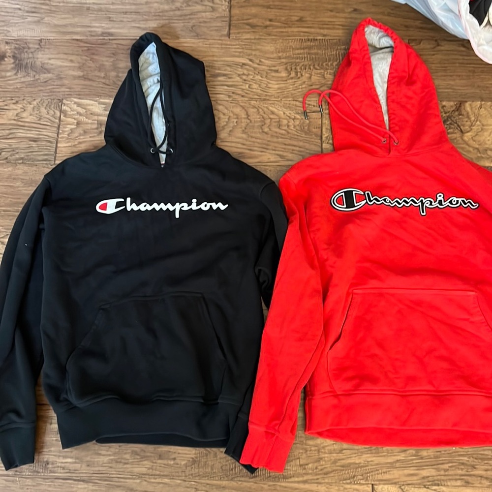 2 Champion Sweatshirts 4”red and a black men’s medium